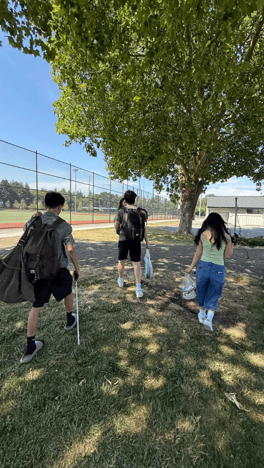 Volunteers surveying the park grounds